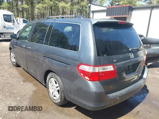 2005 Honda Odyssey EX-L with VIN 5FNRL387X5B069823, listed as a IAAI auction lot 41883007 with 267,250 mi miles and . Bid and sale history available at DreamBid. Image 3.