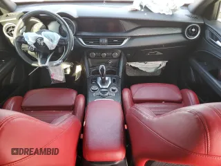 2022 Alfa Romeo Stelvio Sprint z VIN ZASPAKANXN7D28081, wystawiony jako Copart lot #70625994 z przebiegiem Nie podano mil oraz Szkody całkowita. Historia ofert i sprzedaży dostępna na DreamBid. Obrazek 8.
