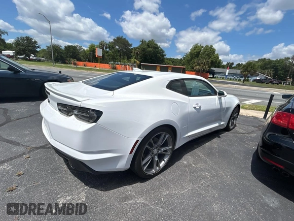 2021 Chevrolet Camaro 1LT with VIN 1G1FB1RS0M0109877, listed as a Copart auction lot 57296035 with 26,486 mi miles and Salvage title. Bid and sale history available at DreamBid. Image 4.