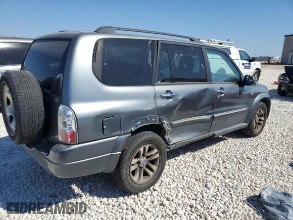 2005 Suzuki XL7 LX z VIN JS3TY92V654107848, wystawiony jako Copart lot #73425794 z przebiegiem Nie podano mil oraz Szkoda całkowita • Salvage title. Historia ofert i sprzedaży dostępna na DreamBid. Obrazek 3.