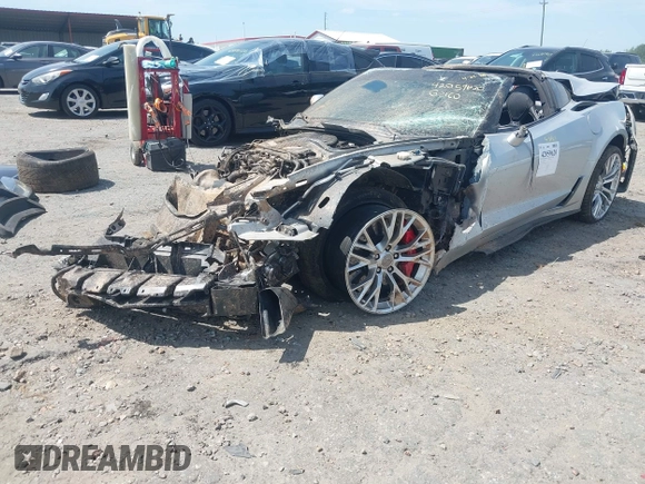 2015 Chevrolet Corvette Z06 2LZ z VIN 1G1YS2D64F5605330, wystawiony jako IAAI lot #42059620 z przebiegiem Nie podano mil oraz . Historia ofert i sprzedaży dostępna na DreamBid. Obrazek 18.