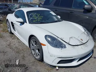 2021 Porsche Cayman with VIN WP0AA2A80MS260426, listed as a IAAI auction lot 41680025 with 19,804 mi miles and . Bid and sale history available at DreamBid. Image 1.
