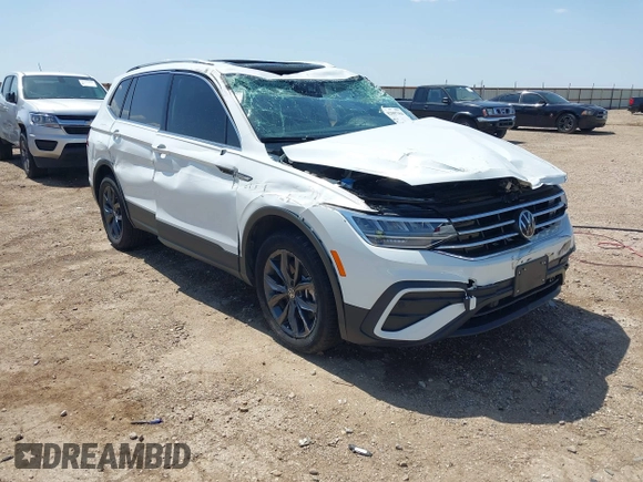 2022 Volkswagen Tiguan SE with VIN 3VV2B7AX2NM010932, listed as a IAAI auction lot 42007364 with 26,014 mi miles and . Bid and sale history available at DreamBid. Image 1.