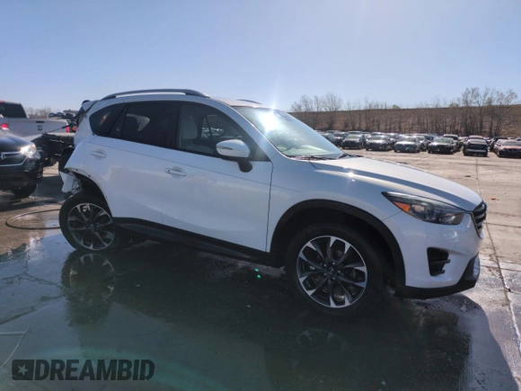 2016 Mazda CX-5 Grand Touring with VIN JM3KE4DY8G0671256, listed as a Copart auction lot 52920975 with 87,822 mi miles and Non Repairable. Bid and sale history available at carsss.com. Image 4.
