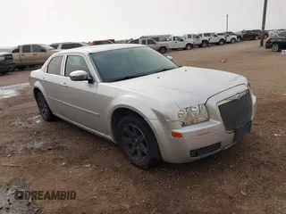 2006 Chrysler 300 Touring with VIN 2C3KA53G36H384442, listed as a IAAI auction lot 41817539 with 129,123 mi miles. Bid and sale history available at carsss.com. Image 1.