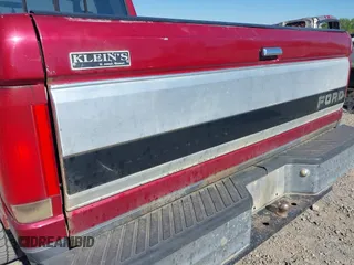 1995 Ford F-150 z VIN 1FTEX14H6SKB75447, wystawiony jako IAAI lot #40212118 z przebiegiem 205 880 mil mil oraz . Historia ofert i sprzedaży dostępna na DreamBid. Obrazek 17.