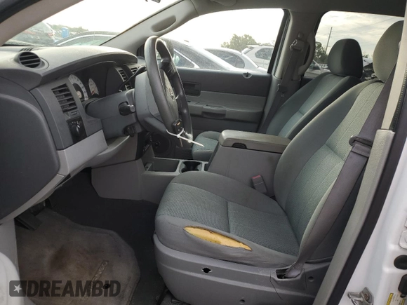 2007 Dodge Durango SXT with VIN 1D8HD38P97F557010, listed as a Copart auction lot 64879915 with 131,101 mi miles and Salvage title. Bid and sale history available at DreamBid. Image 7.
