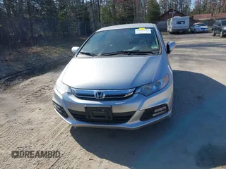 2013 Honda Insight EX z VIN JHMZE2H70DS005200, wystawiony jako IAAI lot #42105624 z przebiegiem 108 949 mil mil oraz . Historia ofert i sprzedaży dostępna na DreamBid. Obrazek 13.