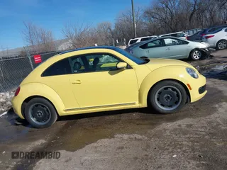 2012 Volkswagen Beetle 2.5L PZEV with VIN 3VWJP7AT9CM610530, listed as a IAAI auction lot 41388728 with 143,909 mi miles. Bid and sale history available at carsss.com. Image 13.