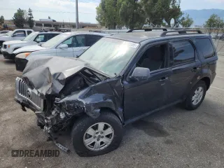 2010 Mercury Mariner z VIN 4M2CN8B72AKJ19479, wystawiony jako Copart lot #64463155 z przebiegiem Nie podano mil oraz Szkoda całkowita • Salvage title. Historia ofert i sprzedaży dostępna na DreamBid. Obrazek 1.