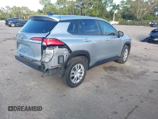 2022 Toyota Corolla Cross L with VIN 7MUAAAAG6NV010688, listed as a IAAI auction lot 41212520 with 50,075 mi miles and . Bid and sale history available at DreamBid. Image 4.