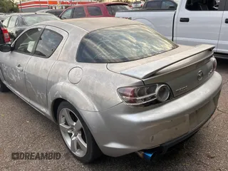2004 Mazda RX-8 with VIN JM1FE17N540130784, listed as a Copart auction lot 76628734 with 122,806 mi miles and Clean Title. Bid and sale history available at carsss.com. Image 3.
