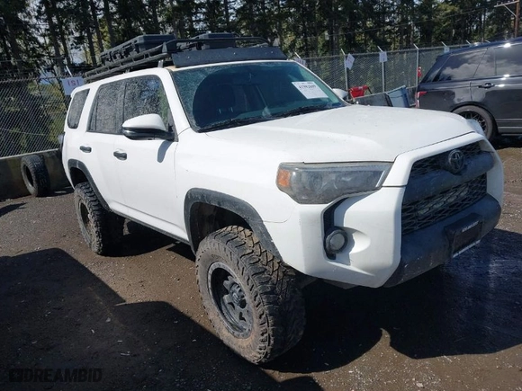 2015 Toyota 4Runner Limited with VIN JTEBU5JR2F5240892, listed as a IAAI auction lot 41982609 with 106,815 mi miles. Bid and sale history available at carsss.com. Image 1.