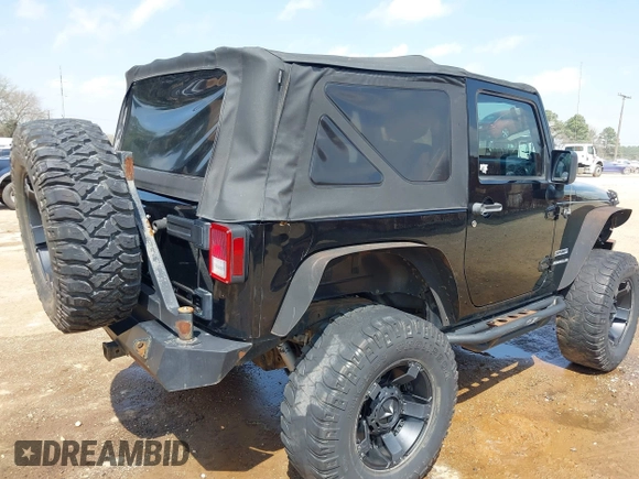2010 Jeep Wrangler Sport with VIN 1J4AA2D15AL161650, listed as a IAAI auction lot 41805852 with 89,952 mi miles and . Bid and sale history available at carsss.com. Image 4.