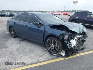 2022 Toyota Avalon Touring z VIN 4T1HZ1FB3NU088304, wystawiony jako IAAI lot #36419998 z przebiegiem 14 956 mil mil oraz . Historia ofert i sprzedaży dostępna na DreamBid. Obrazek 1.