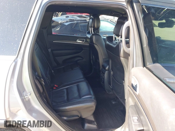 2018 Jeep Grand Cherokee Limited z VIN 1C4RJEBG5JC514356, wystawiony jako IAAI lot #41987271 z przebiegiem 110 521 mil mil oraz . Historia ofert i sprzedaży dostępna na DreamBid. Obrazek 8.