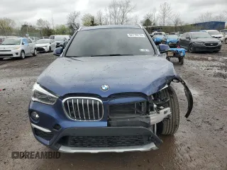 2017 BMW X1 xDrive28i with VIN WBXHT3C3XH5F69573, listed as a Copart auction lot 52719715 with 93,981 mi miles and Salvage Title. Bid and sale history available at DreamBid. Image 5.