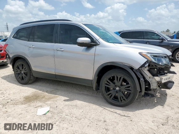 2021 Honda Pilot Special Edition with VIN 5FNYF5H20MB035682, listed as a Copart auction lot 61264095 with 39,722 mi miles and Salvage title. Bid and sale history available at DreamBid. Image 4.