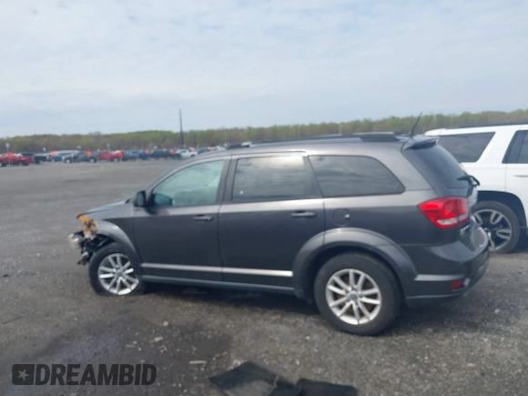 2017 Dodge Journey SXT with VIN 3C4PDDBG5HT618563, listed as a IAAI auction lot 42015188 with 104,747 mi miles and . Bid and sale history available at DreamBid. Image 14.