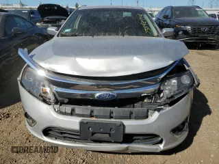 2010 Ford Fusion Hybrid with VIN 3FADP0L37AR400602, listed as a Copart auction lot 73542994 with 111,895 mi miles and Salvage Title. Bid and sale history available at carsss.com. Image 5.