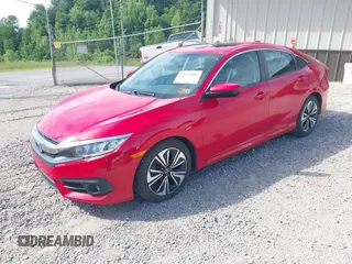 2016 Honda Civic EX-L z VIN 2HGFC1F74GH652090, wystawiony jako IAAI lot #42253881 z przebiegiem 127 863 mil mil oraz . Historia ofert i sprzedaży dostępna na DreamBid. Obrazek 17.