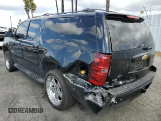 2013 Chevrolet Suburban LT with VIN 1GNSKJE76DR318499, listed as a Copart auction lot 71840624 with 191,050 mi miles and Salvage Title. Bid and sale history available at carsss.com. Image 2.