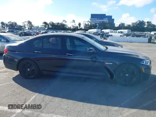 2014 BMW 5 Series 535i with VIN WBA5B1C55ED475332, listed as a IAAI auction lot 41701300 with 139,775 mi miles and . Bid and sale history available at DreamBid. Image 13.