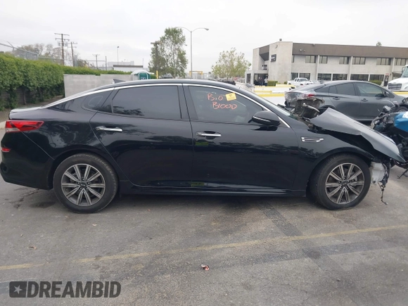 2019 Kia Optima EX with VIN 5XXGU4L14KG290842, listed as a IAAI auction lot 42030617 with Not Provided miles and . Bid and sale history available at carsss.com. Image 14.
