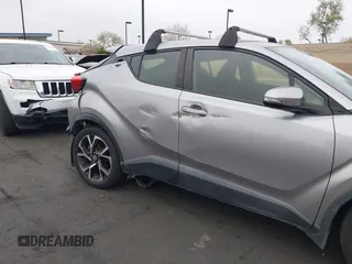 2018 Toyota C-HR XLE with VIN JTNKHMBX5J1011568, listed as a IAAI auction lot 42043867 with 30,699 mi miles. Bid and sale history available at carsss.com. Image 6.