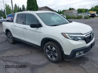 2019 Honda Ridgeline RTL-E with VIN 5FPYK3F71KB017498, listed as a IAAI auction lot 42693038 with 185,068 mi miles and . Bid and sale history available at DreamBid. Image 1.