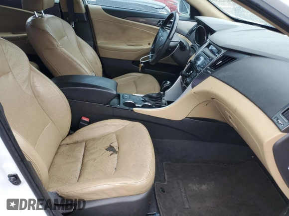 2012 Hyundai Sonata Hybrid with VIN KMHEC4A4XCA057497, listed as a Copart auction lot 82206914 with Not Provided miles and Salvage Title. Bid and sale history available at DreamBid. Image 7.