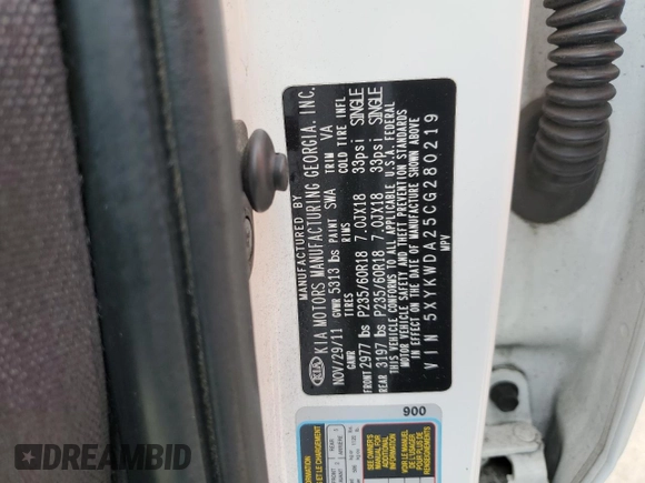 2012 Kia Sorento SX z VIN 5XYKWDA25CG280219, wystawiony jako Copart lot #54397025 z przebiegiem 197 685 mil mil oraz Szkoda całkowita • Salvage title. Historia ofert i sprzedaży dostępna na DreamBid. Obrazek 12.