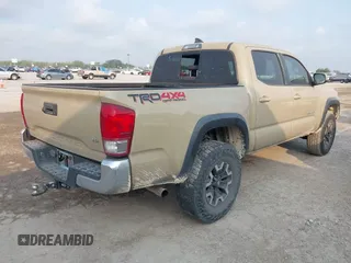 2017 Toyota Tacoma SR5 with VIN 5TFCZ5AN7HX097307, listed as a IAAI auction lot 42337528 with 98,000 mi miles and . Bid and sale history available at DreamBid. Image 4.