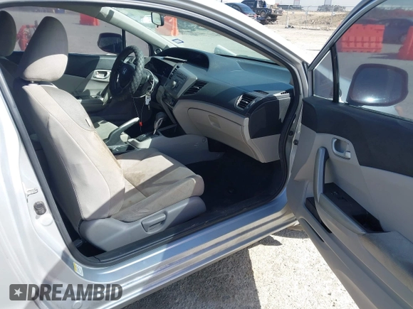 2012 Honda Civic Cpe LX with VIN 2HGFG3B52CH549698, listed as a IAAI auction lot 41818647 with 100,975 mi miles. Bid and sale history available at carsss.com. Image 5.