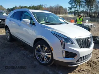 2023 Cadillac XT5 FWD Premium Luxury z VIN 1GYKNCR46PZ110617, wystawiony jako IAAI lot #41822915 z przebiegiem 38 439 mil mil oraz . Historia ofert i sprzedaży dostępna na DreamBid. Obrazek 1.