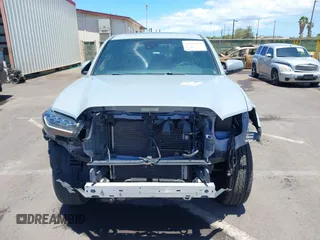 2019 Toyota Tacoma SR with VIN 3TMCZ5AN7KM213537, listed as a IAAI auction lot 42442068 with 39,969 mi miles and . Bid and sale history available at DreamBid. Image 13.