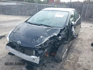 2005 Toyota Prius with VIN JTDKB22U353060181, listed as a IAAI auction lot 42031555 with 165,015 mi miles. Bid and sale history available at carsss.com. Image 2.