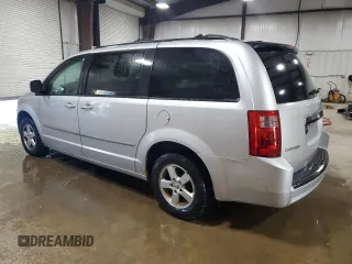 2010 Dodge Grand Caravan SXT with VIN 2D4RN5D1XAR268976, listed as a Copart auction lot 54587505 with 179,000 mi miles and Salvage Title. Bid and sale history available at DreamBid. Image 2.