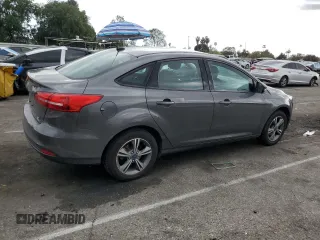 2017 Ford Focus SE with VIN 1FADP3FE3HL235896, listed as a Copart auction lot 50910975 with 74,502 mi miles and Salvage Title. Bid and sale history available at carsss.com. Image 3.