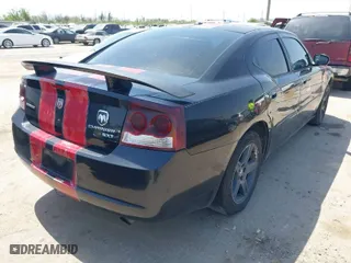 2010 Dodge Charger SXT with VIN 2B3CA3CV5AH242722, listed as a IAAI auction lot 41860780 with 219,023 mi miles. Bid and sale history available at carsss.com. Image 4.