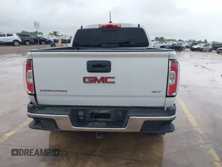 2018 GMC Canyon 4WD SLT with VIN 1GTP6DE18J1111056, listed as a IAAI auction lot 41903405 with 99,280 mi miles. Bid and sale history available at carsss.com. Image 16.