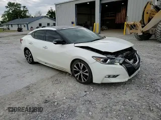 2018 Nissan Maxima Platinum z VIN 1N4AA6AP6JC404541, wystawiony jako Copart lot #58216865 z przebiegiem 85 673 mil mil oraz Szkoda całkowita • Salvage title. Historia ofert i sprzedaży dostępna na DreamBid. Obrazek 13.