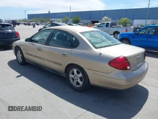 2001 Ford Taurus SES with VIN 1FAFP55U61A104864, listed as a IAAI auction lot 42004016 with 166,694 mi miles and . Bid and sale history available at carsss.com. Image 3.