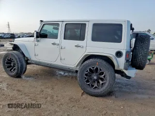 2015 Jeep Wrangler Unlimited Sport with VIN 1C4BJWDG9FL759012, listed as a Copart auction lot 61002465 with 101,395 mi miles and Salvage title. Bid and sale history available at DreamBid. Image 2.