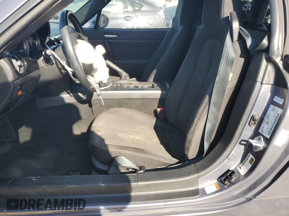 2006 Mazda MX-5 Miata Sport z VIN JM1NC25F260115830, wystawiony jako Copart lot #76844774 z przebiegiem 52 599 mil mil oraz Szkoda całkowita • Salvage title. Historia ofert i sprzedaży dostępna na DreamBid. Obrazek 7.