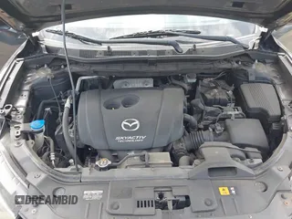 2014 Mazda CX-5 Sport with VIN JM3KE4BE4E0426931, listed as a IAAI auction lot 42055582 with 121,418 mi miles. Bid and sale history available at carsss.com. Image 10.