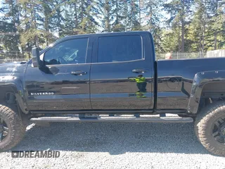 2018 Chevrolet Silverado 1500 LT with VIN 3GCUKREC7JG544365, listed as a IAAI auction lot 42055441 with 57,832 mi miles. Bid and sale history available at carsss.com. Image 14.