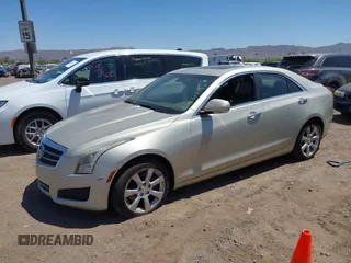 2013 Cadillac ATS Luxury z VIN 1G6AH5R35D0147866, wystawiony jako IAAI lot #42328457 z przebiegiem 142 197 mil mil oraz . Historia ofert i sprzedaży dostępna na DreamBid. Obrazek 2.