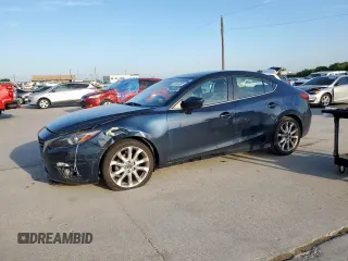 2014 Mazda 3 S Touring with VIN JM1BM1V30E1107668, listed as a Copart auction lot 57525285 with 101,918 mi miles and Salvage title. Bid and sale history available at DreamBid. Image 1.