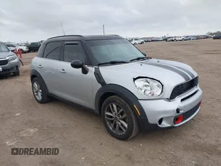 2014 MINI Countryman S with VIN WMWZC3C54EWP29918, listed as a IAAI auction lot 41466066 with 154,061 mi miles and . Bid and sale history available at DreamBid. Image 1.